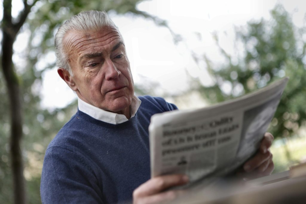 Old man reading scaled 1